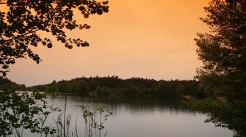 Lake with Red Cloud Stock Photos