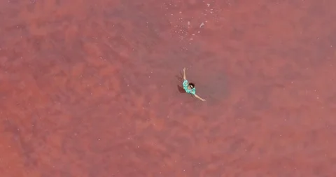 Lake with red water Stock Footage 138933251