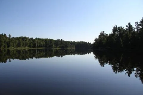 Lake reflections Stock Photos