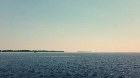 Lake. river view in motion. White seagulls flying above the lake on sunny day Stock-Footage 158742125