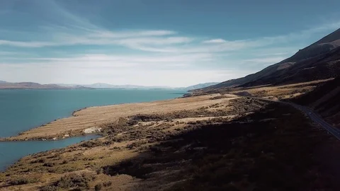 Lake road with Mountains Stock Footage 94686007