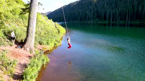 Lake Rope Swing - Boy Does Backflip Video stock 150728305