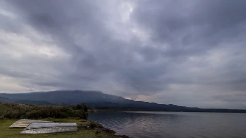 Lake Rotoaira timelapse with fast clouds and Mount Tongariro in the background Stock Footage 70373547