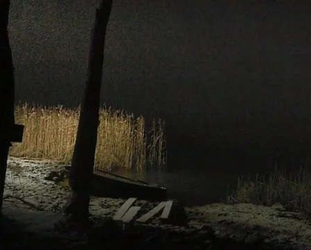 Lake rushes boat snowing Stock Footage 11298853