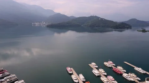 Lake scenery shrouded in mist cloud, exchanging light, shadow, sailing ship Video stock 280150831