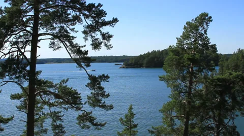Lake setting with motor boat Stock Footage 27557498