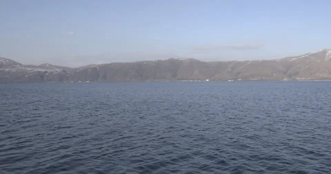 Lake Sevan Armenia Wide Shoreline with Distant Mountain Landscape 4K Stock Footage 326637230