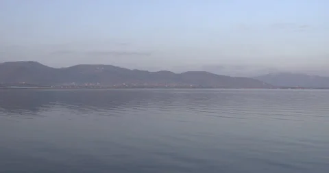 Lake Sevan Armenia Wide Soft Light Distant Landscape 4K Stock Footage 326639413