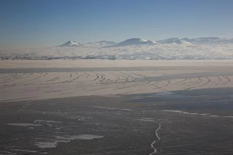 Lake Sevan covered with ice Stock Photos