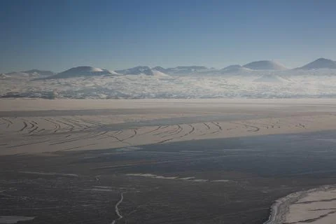 Lake Sevan covered with ice Stock Photos