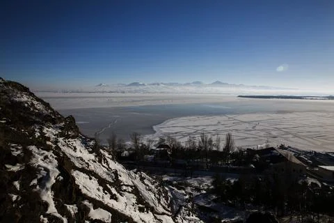 Lake Sevan covered with ice 写真素材