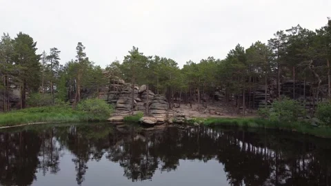 Lake Shaitankol meaning Devil's Lake Karkaraly. Drone view Stock Footage 208735479
