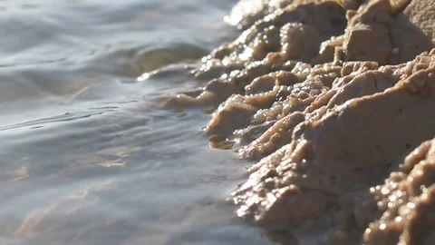 Lake shore made of rocks Stock Footage 153035974