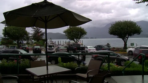 Lake side cafe. Rainy day. Stockbeeldmateriaal 75330792