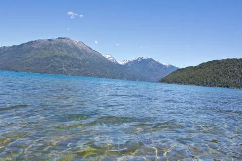 Lake side with mountain range in the background close to El Bolsn. Perfect .. Stock Photos
