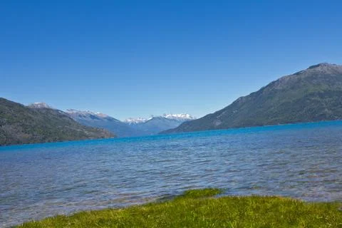 Lake side with mountain range in the background close to El Bolsn. Perfect .. Stock Photos