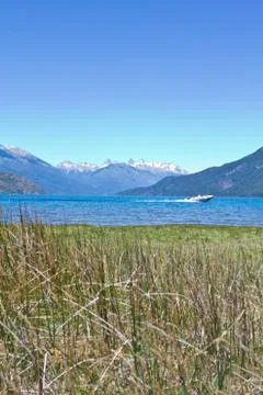 Lake side with mountain range in the background close to El Bolsn. Perfect .. Stock Photos