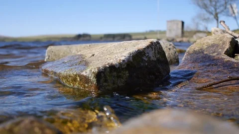 Lake side stone Stock Footage 87684427
