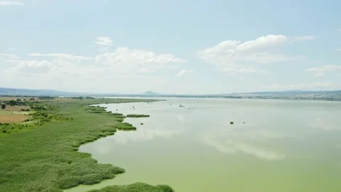 Lake with sky reflection on water Stock Footage 133379196