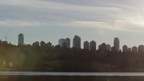 Lake &amp; Skyline Sunset Stock Footage 72125882