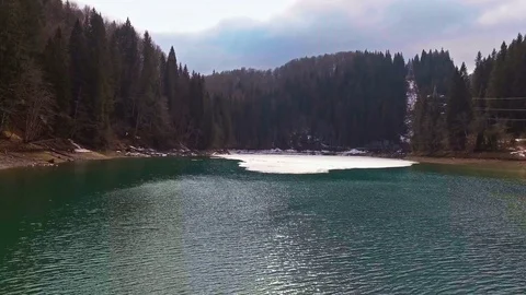 Lake With Snowy Mountains In Background Stock Footage 74169592
