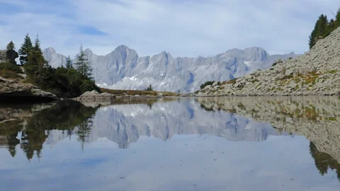 Lake Spiegelsee with reflections of Dachstein hyperlapse, Austria Stock Footage 172444010