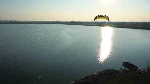 Lake with the sun, wind kite close-up aerial shot Stock Footage 47930119