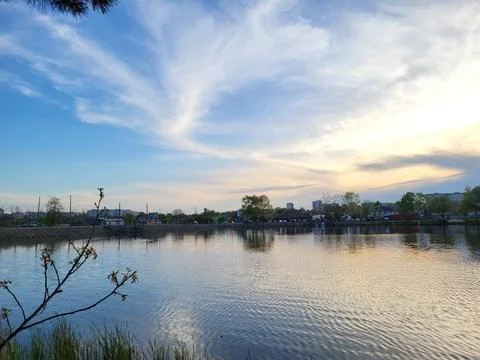 Lake at Sunset With Cloud Reflections Stock Photos