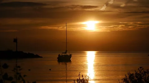 Lake Sunset With Golden Clouds and Sailboat 03 Stock Footage 47293285