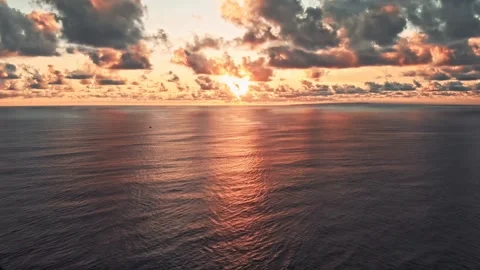 Lake sunset or sunrise. The sky dramatic, billowing clouds in hues of pink. Stock Footage 297846653