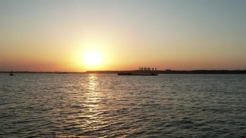 Lake Sunset Over Forested Shoreline in Nanjing, China Stock Footage 344037148