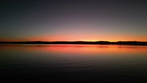 Lake sunset panning shot Stock Footage 209863403