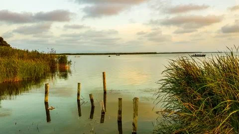 Lake with sunset Stock Photos