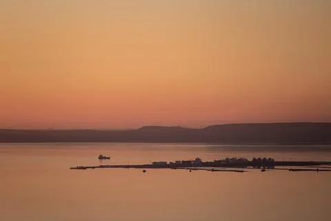 Lake at sunset Stock Photos