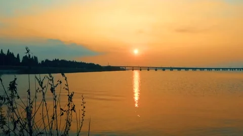 Lake Sunset Reflection Shimmering in Golden Evening Light on Still Water Stock Footage 341911359