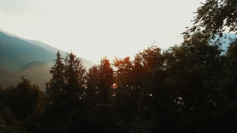 Lake sunset view. magic hour. golden dusk sky. aerial view. Levico, Italy. Stock Footage 97616940