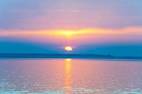 Lake sunset view Stock Photos