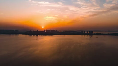 Lake Surface at Sunset 4K Aerial Moving Timelapse Stock Footage 321001060