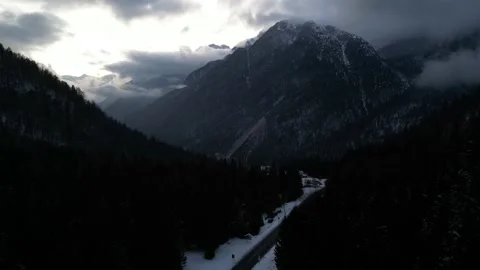 Lake surrounded by mountains Stock Footage 237776861