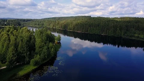 Lake surrounded by trees Stock Footage 94546509