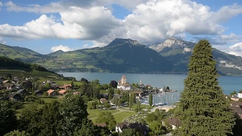 Lake Thun with townscape of Spiez Stock Footage