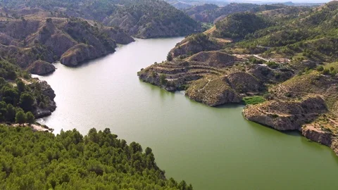 Lake of the Tibi Dam that is a masonry dam on Monegre River in Spain. Video stock 112710223