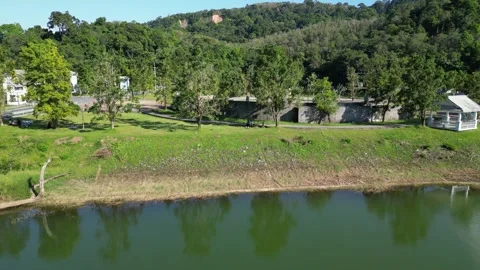 Lake with trees and gazebos Video stock 296159308