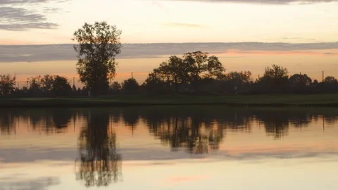 Lake With Trees At Sunset Pan Stock Footage 127036024