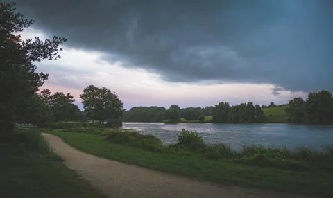 Lake with trees in the sunset Foto stock