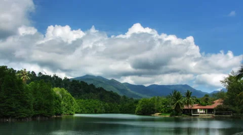 Lake under clouds time lapse Stock Footage 5163926