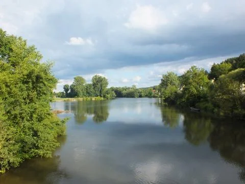 A lake under stormy clouds Stock Photos