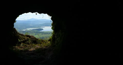 Lake View from Inside a Rocky Cave Stock Footage 291906820