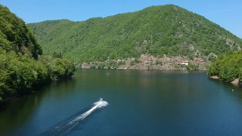 Lake View with Jet Sky passing Stock Footage 94509461