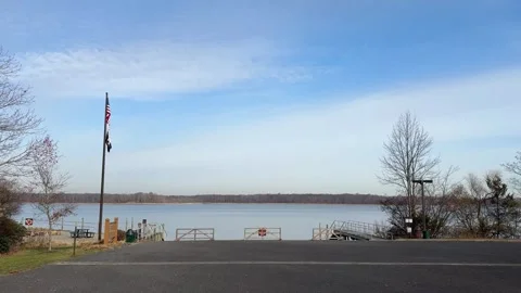 Lake view with one tree and flag 動画素材 294886575